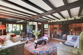 The terrace is furnished for dining, and areas for lounging in the day and sunset drinks in the evening. A Medieval Manor House In Sussex With Its Own Swimming Pool Golf Course And A Fresco In The Sitting Room Laptrinhx News