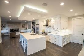 There is a wide array of materials that can be used to make waterfall edge countertops, such as granite, quartz, or composite materials. White Quartz With Waterfall Edge And Calacatta Backsplash Contemporary Kitchen Calgary By Stone Age Granite Inc Houzz