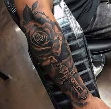 Getting a wooden cross tattoo is a clear notion of the dedicated faith, as jesus has been crucified on the wooden cross that is a good option for men as the design is simple, still vivid. Small Rosary Tattoo Men Novocom Top