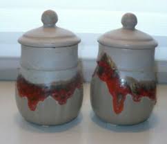 The history of jianshui purple pottery, which is also known as southern yunnan red jade, goes back hundreds of years. 2 Vintage Laurentian Pottery Red Drip Canisters Pots Jars Lp Canada Coffee Tea Ebay