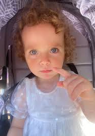 I have this beautiful picture of my youngest granddaughter could you do  something nice for the back ground please rather then her buggy thank you x 