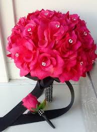 There to provide a pop of colour were flowers taking on a bright shade of magenta at both the ceremony and reception. Black And Red Silk Rose Corsage Vtwctr