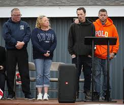 More than 100 gather at Newport vigil