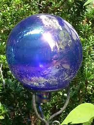 Have made several more of the garden globes with everything from bowling balls to vintage light fixtures. Gazing Balls In The Garden Why Do We Have Them