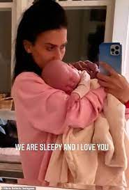 Hilaria Baldwin Cradles One Of Her Two Infants In Heart Melting Instagram Snap Daily Mail Online