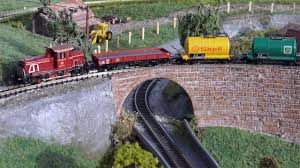 The trains reside in an annular space. Z Gauge Micro Railway In A Coffee Table Youtube