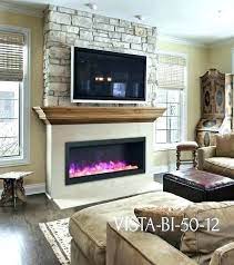 How to mount a tv above a fireplace and hide wires for wall mounted tv. Tv Above Fireplace Ideas Above Electric Fireplace Sierra Flame Vista Electric Stone Wall Wo Decoration Cheminee Decoration Salon Salle A Manger Cheminee Fausse