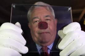 Killer's rare stamp fetches $9 million