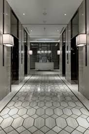 Black And White Restaurant Floor Tiles White Wooden Marble In 2020 Lobby Design Floor Tile Design Corridor Design