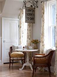 A bistro set brings parisian charm right to your backyard. A White Bistro Table Sits Beneath A Vintage Restaurant Sign In This Kitchen Breakfast Nook R Sarah Richardson Farmhouse Kitchen Sitting Areas Sarah Richardson