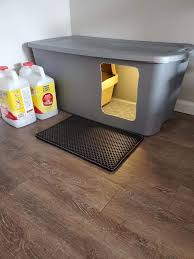 There are mats that are custom designed to trap litter as your cat exits the litter box. Litter Box Hack To Stop Cats From Making A Mess On The Floor Popsugar Pets