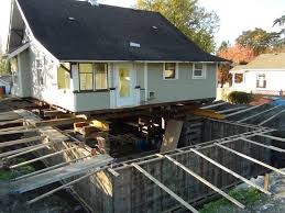 Adding a basement to your home requires digging out the soil around the house. The Basement Takes Shape Hammond Forever House