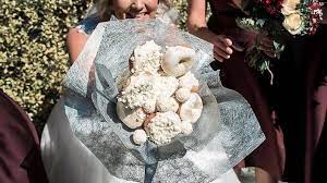 11 alternative wedding bouquet ideas that don't involve flowers. Sydney Bride Walks Down The Aisle Holding Bouquet Made Of Doughnuts Sbs Food