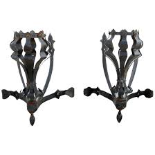 Tuscan hanging candeliere glass pendant sconce decorous wall fixture with a candeliere pendant sconce, crafted of clear glass and hammered metal. Pair Of American Medieval Style Painted Wrought Iron One Light Corner Eron Johnson Antiques Ruby Lane
