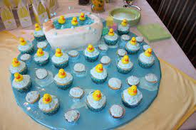 The colorful giraffe topper has a very satisfied expression, as though he wanted it to be a boy. 70 Baby Shower Cakes And Cupcakes Ideas For Girls And Boys