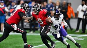Falcons fall to Ravens 30-23 in OT as Michael Penix Jr. exits injured — CBS News