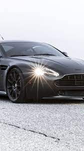 Aston Martin Vantage Black Bmp Iphone 5s Wallpaper Aston Martin Vantage Aston Martin Cars Aston Martin