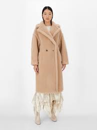 A part of hearst digital media town & country participates in various affiliate marketing programs, which means we may get paid commissions on editorially chosen products purchased through our links to retailer sites. Camel Teddy Coat Albino Ted Max Mara