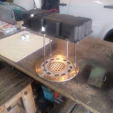 Table Lamp Made From Repurposed Motorcycle Oil Pan And Disc Brake Rotor Additional Parts Include Mc Cylinder Head Studs Motorcycle Decor Oil Pan Cylinder Head