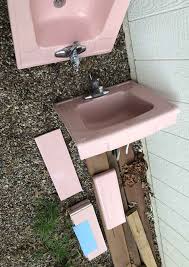two pink universal rundle sinks with 10