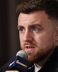 Clash of personalities as well as styles. The outgoing Jono Carroll and the  shy Colm Murphy at Queensberry St Patrick's Day press confernce today. No  one saw this match-up coming, but it's