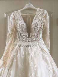 Dress in your underwear or a leotard, and tie a narrow ribbon or a piece of elastic around your waist, but not too tight. Sample Crystal Design Chantale Wedding Dress Size 4 1 999
