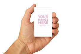 Today, business cards are more than just a piece of cardstock with information. Man Holding A Vertical Business Card Mockup Mediamodifier