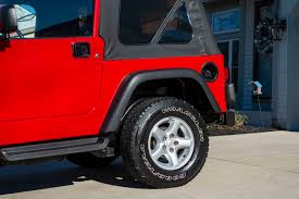 Image result for Flame Red 2006 Jeep