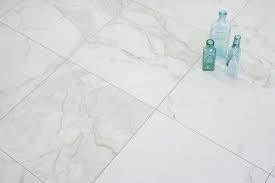 Porcelain floor and wall tile (17.6 sq. Love This Tile Looks Like Marble Our Lowes Carries It Calacatta 18x18 Porcelain Tiles At Mission Stone Tile Also Com Stone Tiles Fireplace Redo Calacatta