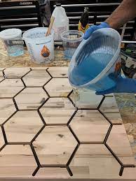 Resin Casting A Floating Hexagon Table Resin Casting And Art Supplies In 2020 Hexagon Wood Hexagon Epoxy Wood Table