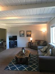 I'm not sure what you mean by stain grade paint. Gray Living Room Blue Living Room Painting Living Room Wood Ceilings White White Wooden Beams Hom Beams Living Room Wood Beam Ceiling Blue Paint Living Room