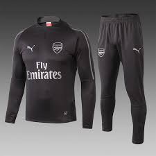 The elegant art deco facade of highbury's east stand informs the look of this arsenal jersey for juniors. Pin On Arsenal