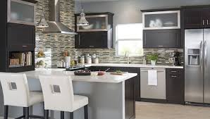 Tan brown and white cabinets combined with simple white tile backsplash. Kitchen Planning Guide Ideas Inspiration