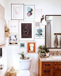 How To Hang A Gallery Wall The Right Way Bathroom Gallery Wall Bathroom Gallery Room Decor