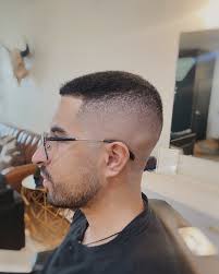 At Scissor & Bone, we're passionate about the artistry behind the high skin  fade. It's a timeless style that merges classic techniques with modern  trends. Perfect for any professional setting or casual