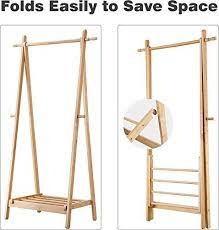 It is constructed from sustainable and renewable bamboo. Amazon Com Langria Foldable Bamboo Clothes Laundry Rack With 4 Side Hooks Lower Shoe Shelf For Extr Diy Clothes Rack Clothing Rack Diy Wood Projects Furniture