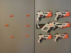 When we were organizing our boys' rooms, we didn't know how we were going to store their nerf guns. Nerf Wall Mount Stlfinder