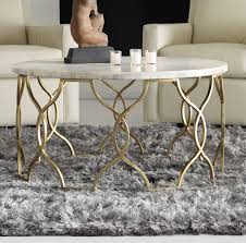 This coffee table features a unique design that allows the top to lift up and there's a convenient drawers for items you want to have easier access to. Round Stone Coffee Tables You Ll Love In 2021 Wayfair
