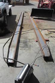 The straps located between the stake pockets are drilled for the hook type ratchet straps: Gooseneck Trailer Build Tractorbynet