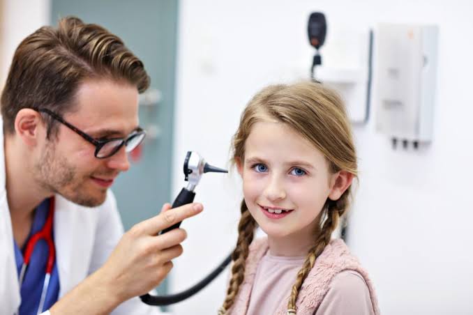 ENT specialist examining patient at Profrea
