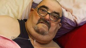 Obese man says ambulance crew dropped him from his wheelchair leaving him  like a 'beached whale'