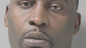 Coke-caked microwave, Ecstasy, loaded AR-15 lands man in jail