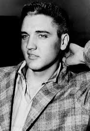 A young Elvis Presley in his early days—charisma, style, and that  unmistakable look that made him a legend! 🎶🔥