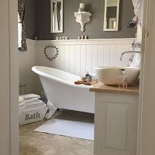 Clean and welcoming bathroom ideas using tile for modern farmhouse or cottage style! Cottage Bathroom Design Ideas Savillefurniture