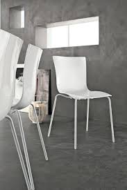 modern stacking chair, in metal plastic