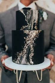 Black White And Gold Marble Wedding Cake Ideas Emmalovesweddings White doesn't have to be the only traditional wedding color.