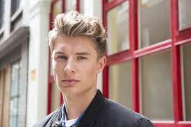 Hold the curling iron vertically and wrap the entire section of hair around the barrel. How To Get Curly Hair For Men In 5 Easy Steps