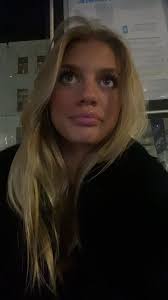 Urban Night Imagery Featuring Mysterious Blonde Figure