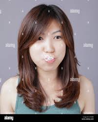 Girl chewing gum hi-res stock photography and images