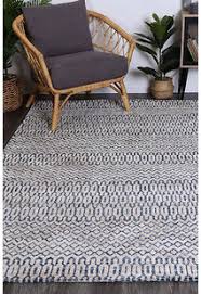 This construction method employs the use of a 'gun', which is a tool that is operated by hand and allows the artisan to punch strands of fibre into a canvas that is stretched across a frame. Tufted Rug Hand Tufted Rug Afterpay 30 Day Returns